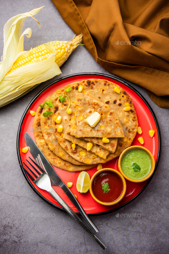 Sweet corn stuffed paratha or parotha served in a plate, Indian