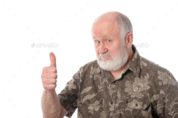 Senior man shows thumbs up gesture, isolated on white