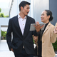 Smart young asian businessman discussing business plan with senior businesswoman. - PhotoDune Item for Sale