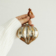 Hand holding christmas vintage ornament on white background. Merry Christmas! Atmospheric time - PhotoDune Item for Sale
