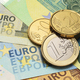 Euro coins on the different paper bills. - PhotoDune Item for Sale
