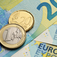 Euro coins on the blue paper bills. - PhotoDune Item for Sale