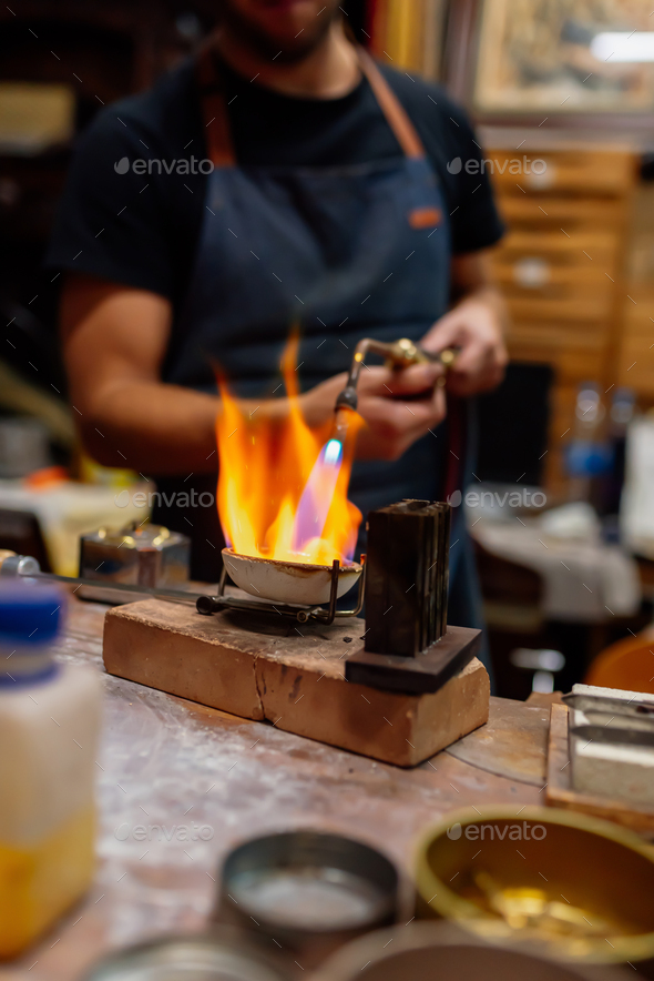 torch melting metal Stock Photo by Meniphoto PhotoDune