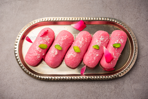 Pink Chumchum or rose flavoured chum chum or cham cham, indian and