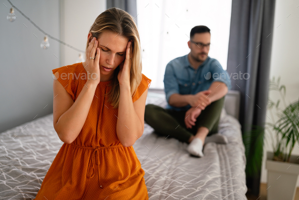 Unhappy couple having argument at home. Family, problem, quarell people concept