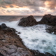 Sea sunrise at rocky beach - PhotoDune Item for Sale
