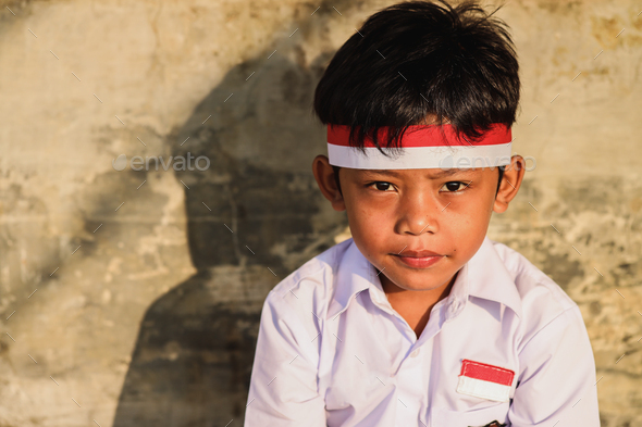 Portrait Of Indonesian Elementary Student Boy Wearing Flag Atribute ...