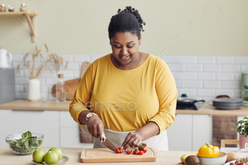 Woman Cooking in Kitchen
