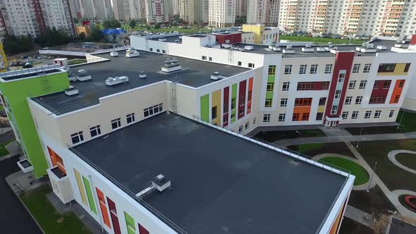 the exterior of the new modern school in the modern residential district,exterior alt