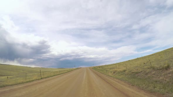 POV point of view - Driving through countryside in Eastern Colorado. alt