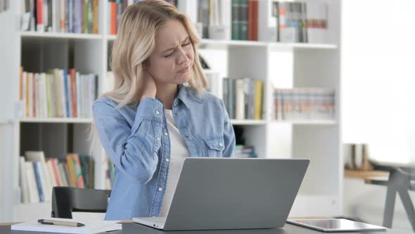 Tired Young Woman with Neck Pain at Work alt