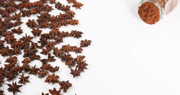 Star Anise illicium verum,, spice falling against White Background, Slow Motion 4K alt