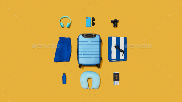 Flat Lay Shot Of Blue Suitcase Unpacked With Holiday Accessories On Yellow Background - Stock Photo - Images