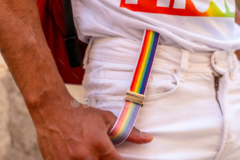 Rainbow suspenders of a gay black man at the pride party, LGBT flag
