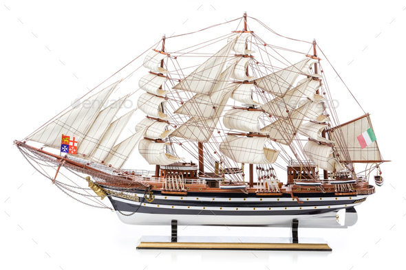 Model of wooden sailing frigate on white background - Stock Photo - Images