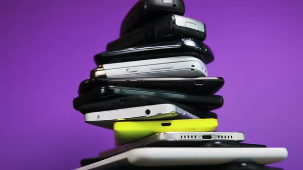 Old, Broken and Scratched Smartphones and Mobile Phones