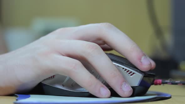 Hand with a Computer Mouse