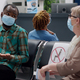 African american patient talking to senior woman with face masks - PhotoDune Item for Sale
