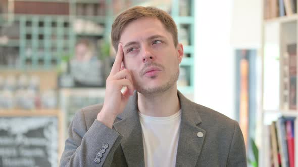 Portrait of Pensive Young Man Thinking Feeling Worried alt