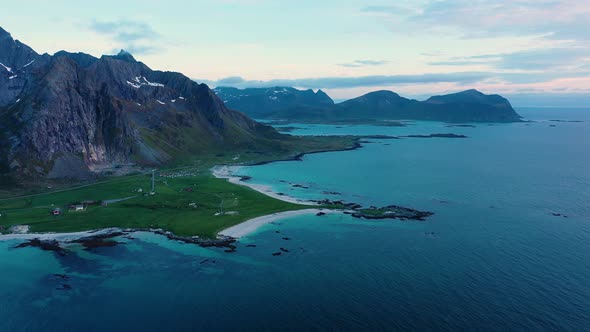 Fly over the sea and view on Flakstad and Skagsanden beach,Lofoten Islands