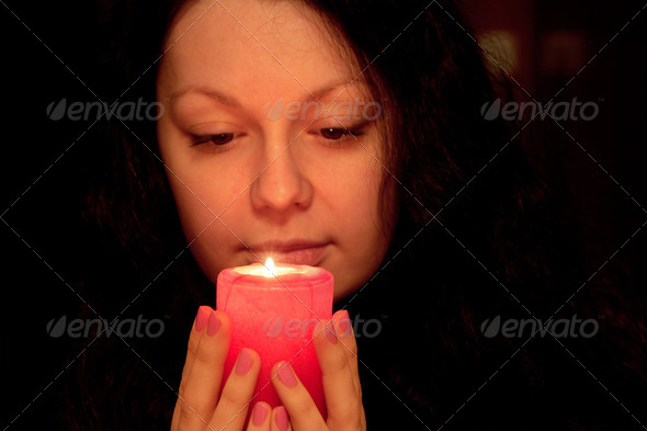 The woman with burning candle