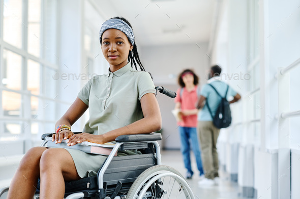 Student with disability at school corridor