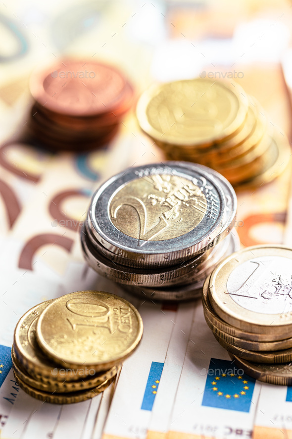 Euro coins on euro banknotes - Stock Photo - Images
