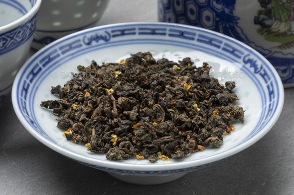 Bowl with Gui cha Osmanthus dried tea leaves close up Stock Photo by ...