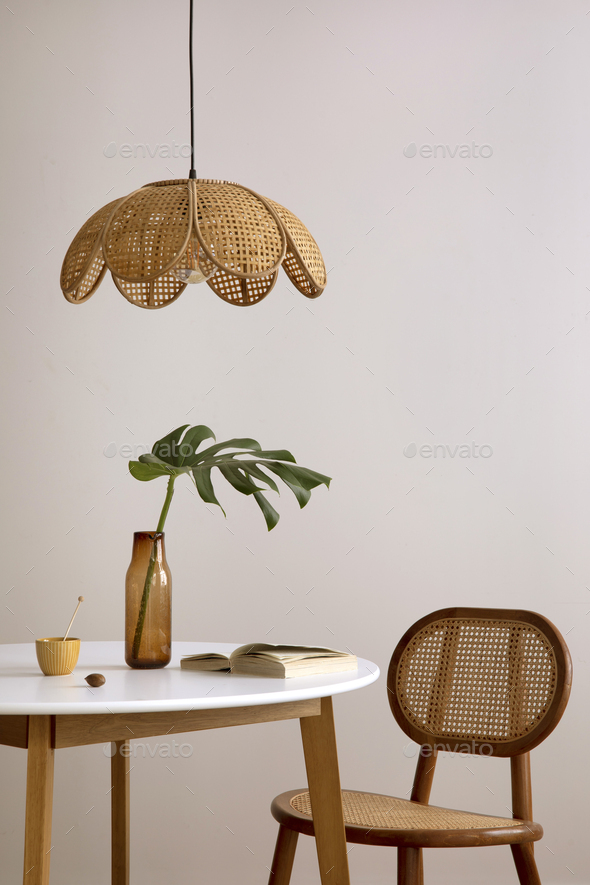 The stylish dining room with round table, rattan chair, Stock Photo by