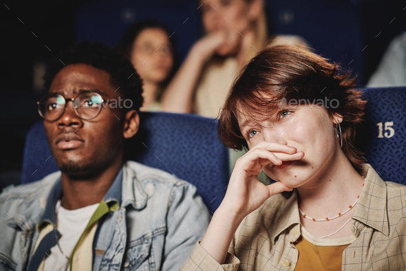 Young Couple Watching Sad Movie