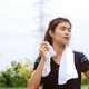 Girl is wiping sweat after exercise. - PhotoDune Item for Sale