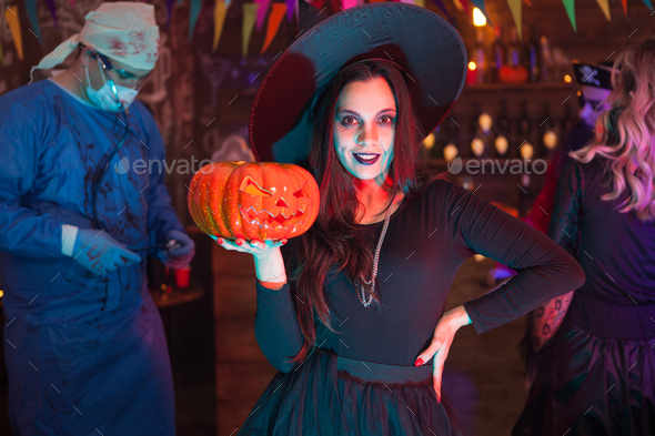 Friends celebrating halloween looking like scary monsters Stock Photo ...