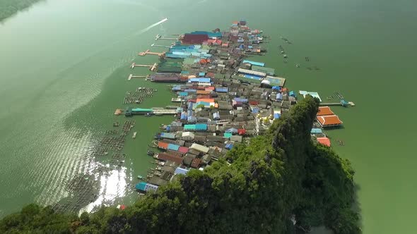 Overlooking Beautiful Koh Phanyee Floating Fishing Village surrounded by Limestone Cliffs at Phang N alt