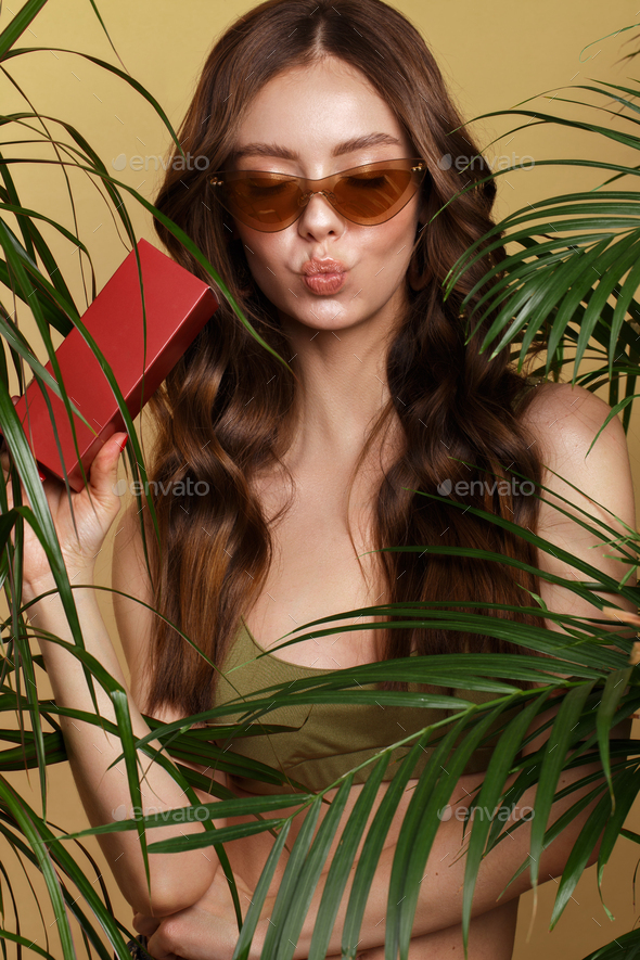 woman in bikini, green plants. Stock Photo by Kobrinphoto PhotoDune