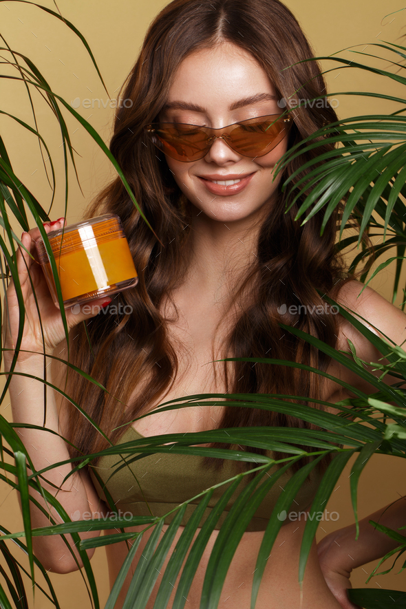woman in bikini, green plants. Stock Photo by Kobrinphoto PhotoDune