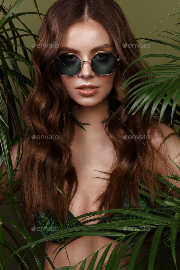 woman in bikini, green plants. Stock Photo by Kobrinphoto PhotoDune