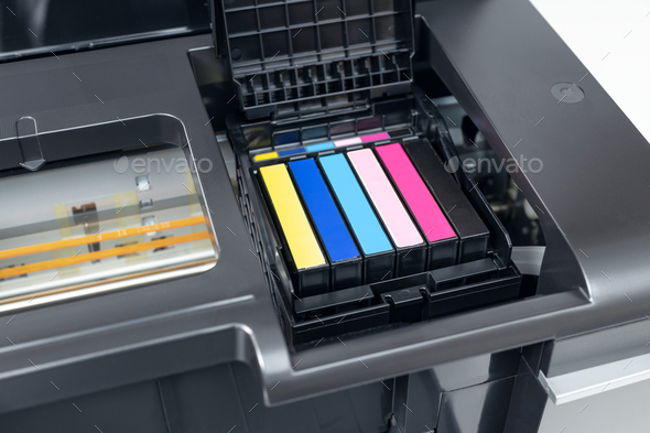 Close up of a multicolor ink cartridges of a inkjet printer.