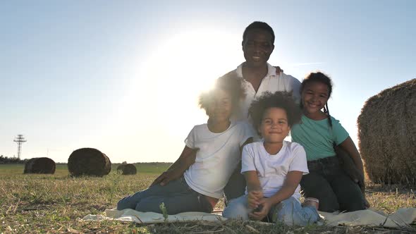 African American Family During Countryside Leisure alt