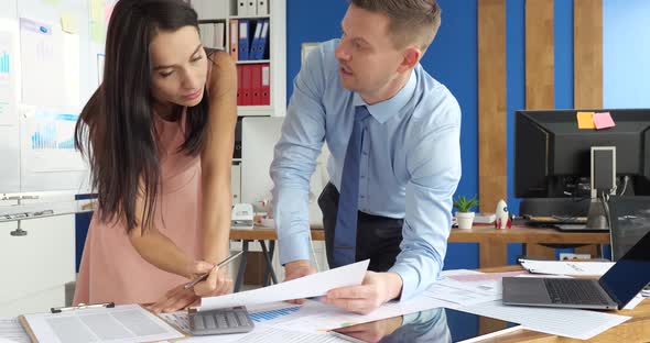 Businessman and Businesswoman Communicate and Make a Successful Business Plan alt