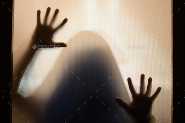 Shadowy figure behind glass - creepy, horror background Stock Photo by ...