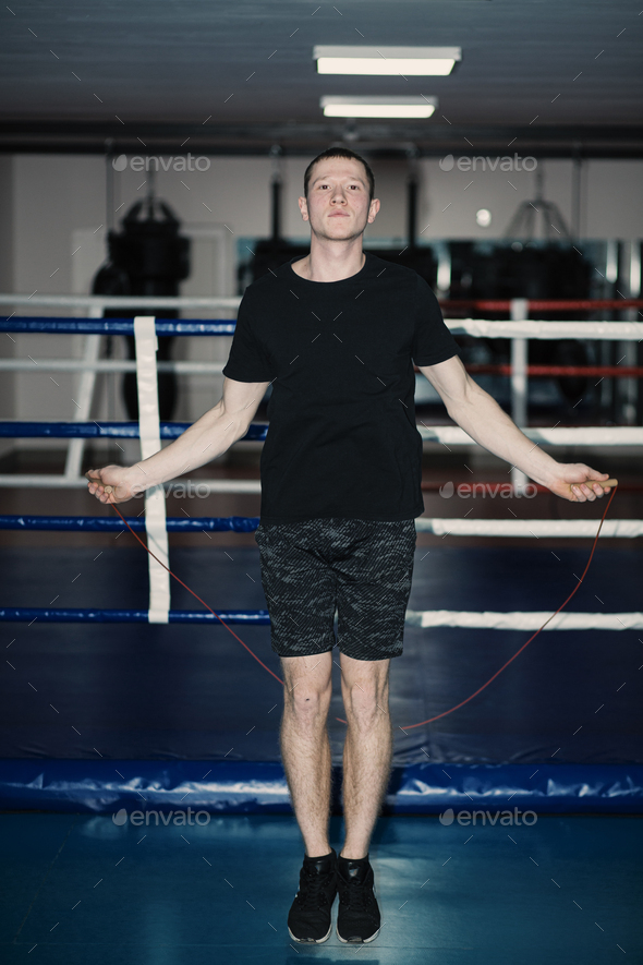 Boxers train in the ring and in the gym Stock Photo by yavorandriy