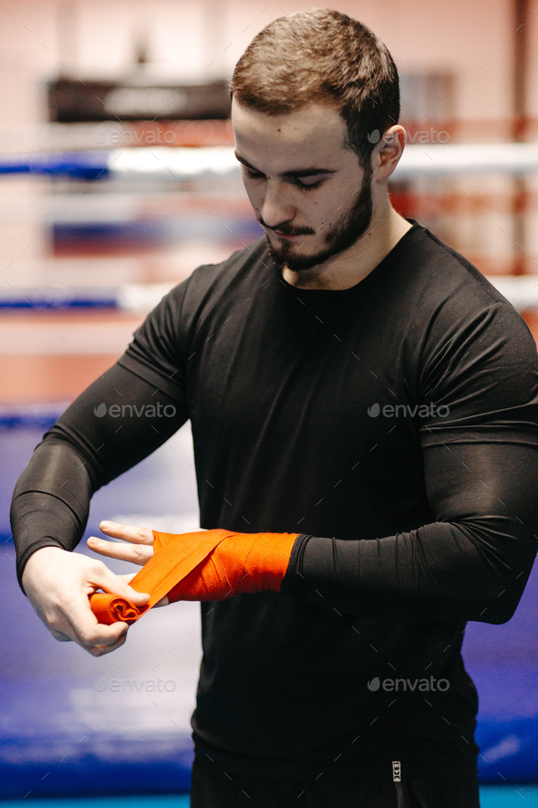 Boxers train in the ring and in the gym Stock Photo by yavorandriy