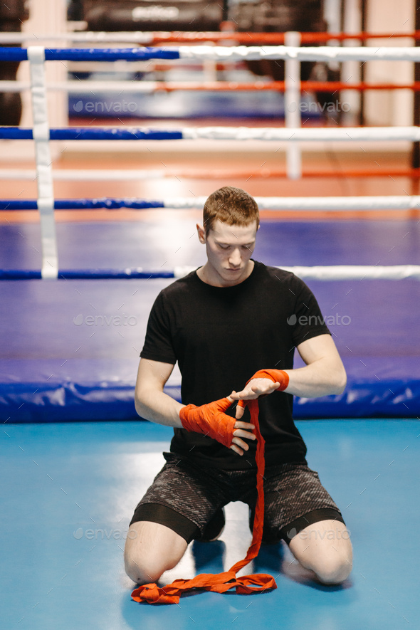 Boxers train in the ring and in the gym Stock Photo by yavorandriy