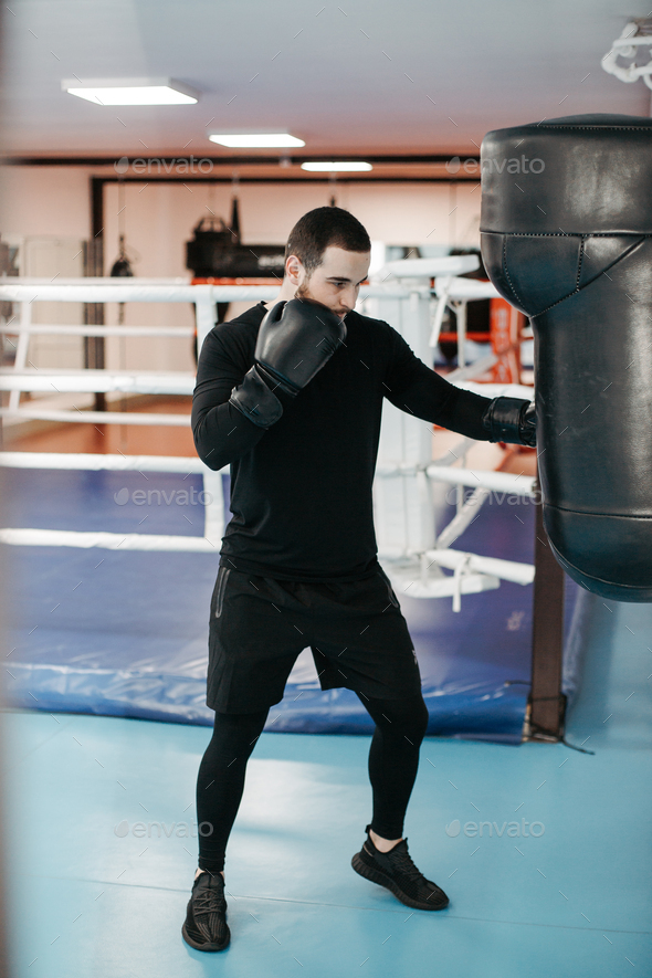 Boxers train in the ring and in the gym Stock Photo by yavorandriy