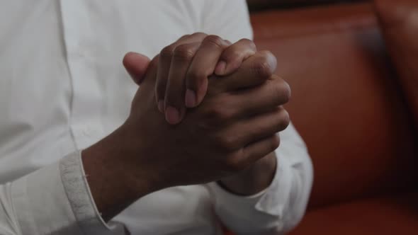 Close Up of Man's Hands Squashed in Relief in Slow Motion alt