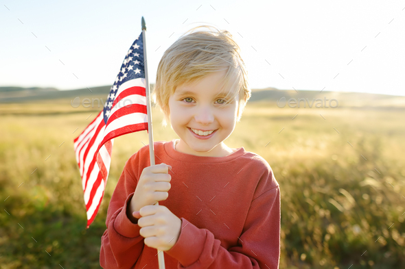 Happy child running and jumping with american flag symbol of United ...