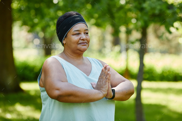 Black Woman doing Yoga Outdoors