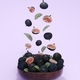 Fresh figs fruits and slices of figs falling and levitating, purple background , 3d rendering - PhotoDune Item for Sale