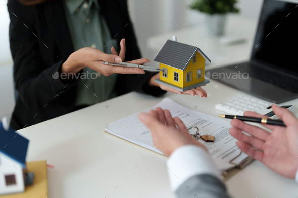 Real estate agent offered home sales and explained the terms of signing the house purchase contract