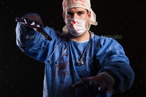 Halloween costume of a mad doctor covered with blood